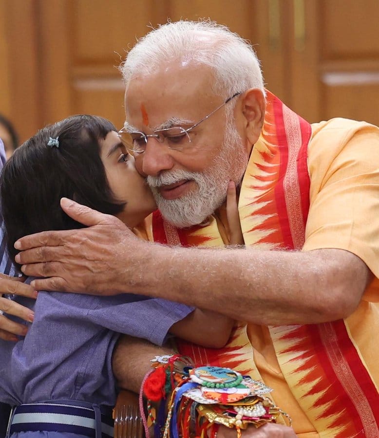 PM Modi Celebrates Raksha Bandhan with Students, Brahma Kumari Members