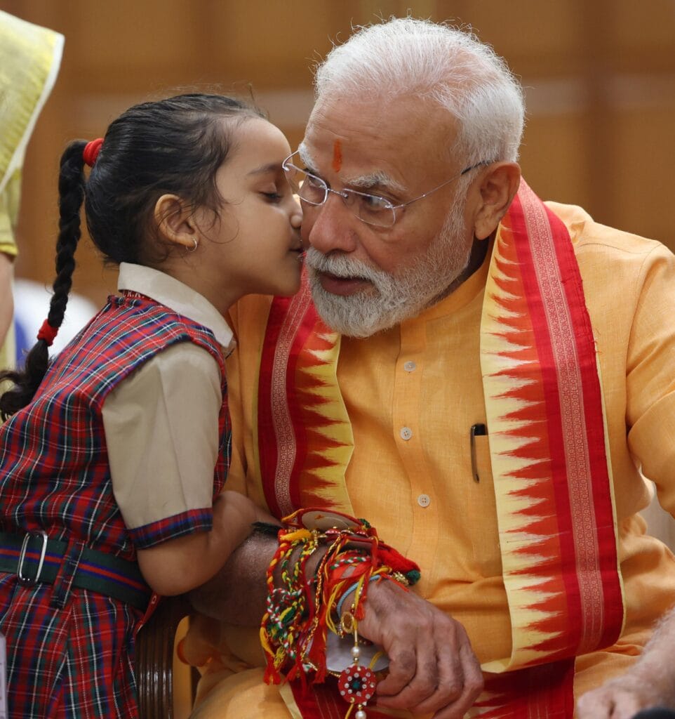 PM Modi Celebrates Raksha Bandhan with Students, Brahma Kumari Members